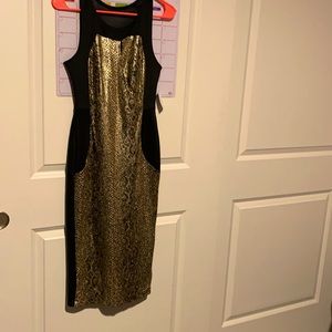 Black dress with shimmering gold animal print